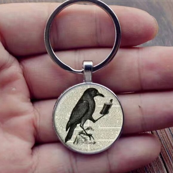 Raven reading a book Keychain with bag charm - Picture 1 of 3